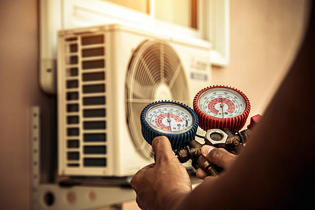Professional Air Conditioning Service technician working in Daytona Beach, FL